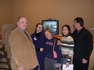 Laura Yuen with the St. Paul Pioneer Press poses at Eagan Hills Church with family and friends of Mike Hanson in Fallujah, Iraq. Dec. 1, 2004.