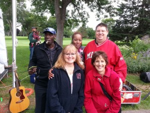 Musical artist Monaye Love with her manager in the back row. Monaye’s husband and 9 month old son in the background. Brian Cole from Red Hat back right. Kathy Dunaway and MaryRose Varo, left to right front row.